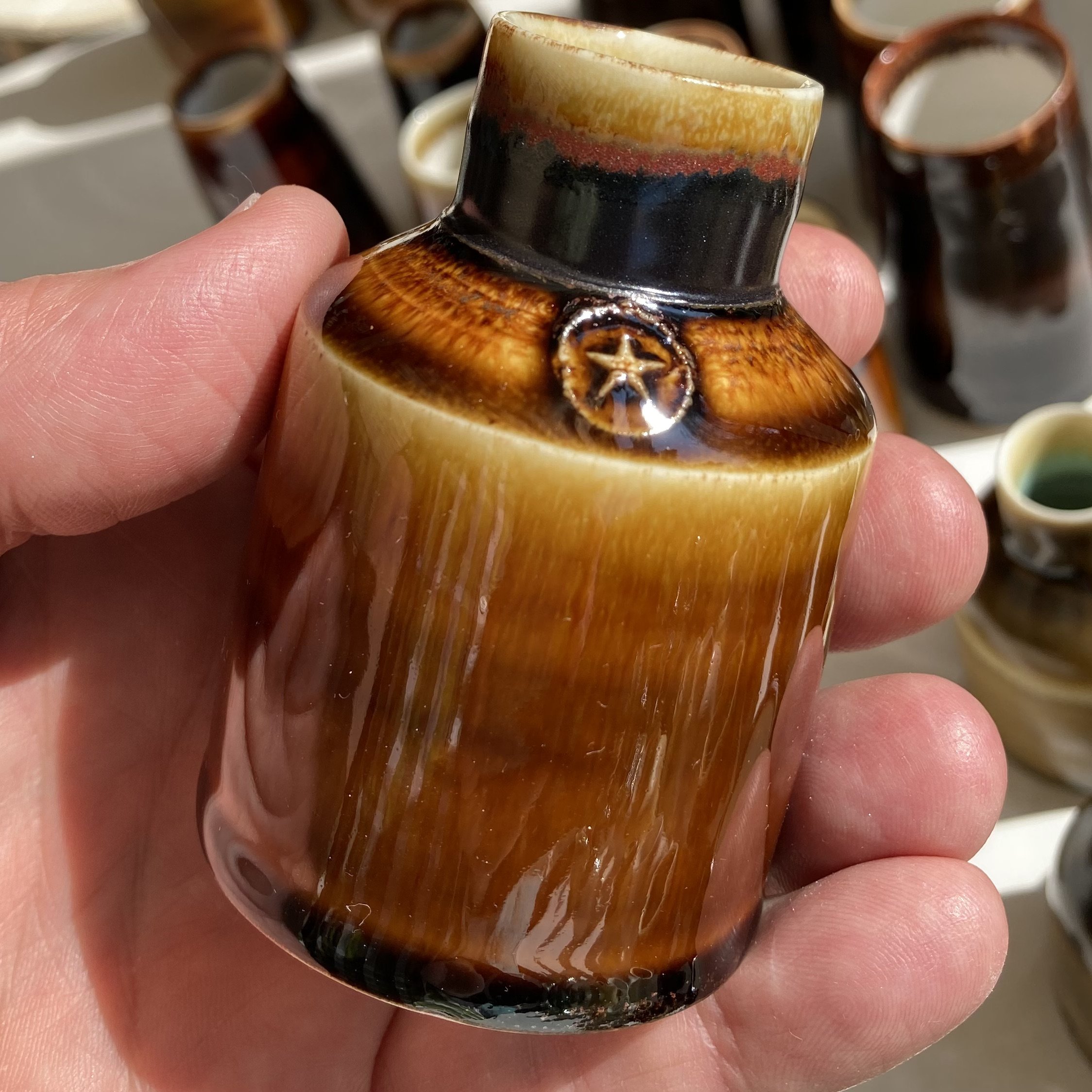 A thrown ceramic bottle by Simon Hulbert, on the shelves at The Hay Makers, Hay-on-Wye